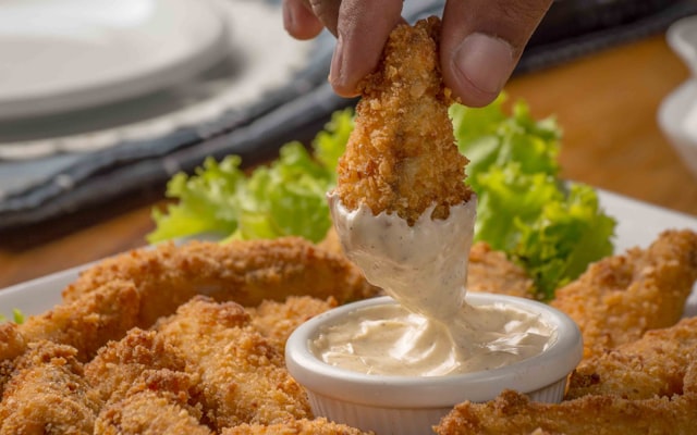 Photo by Léo Roza on Unsplash — representative image for KFC (KFC)