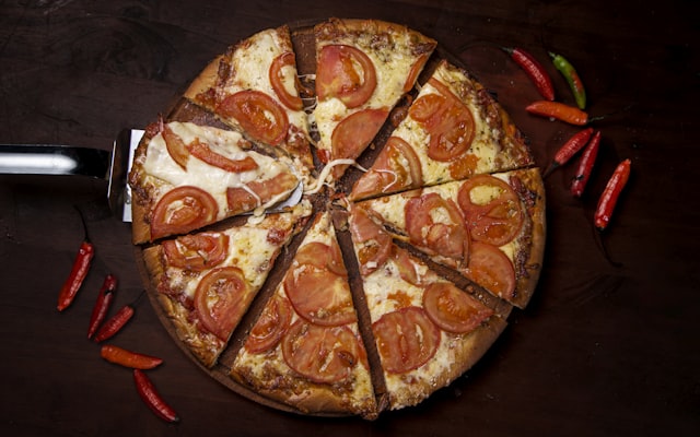 Photo by Adrian Maximiliano Arellano on Unsplash — representative image for Pizza Gallery