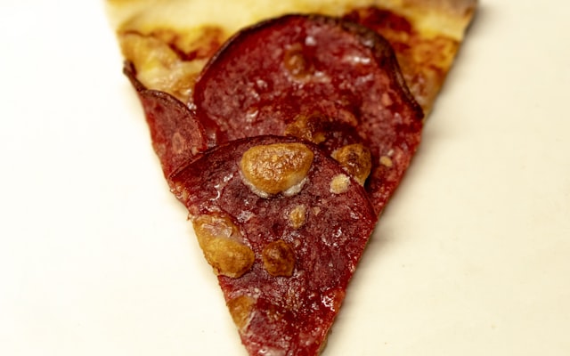 Photo by amirali mirhashemian on Unsplash — representative image for Domino's Pizza (Domino's)